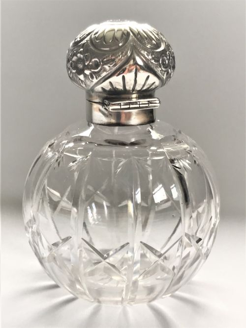 fig 1. An Edwardian silver mounted cologne bottle