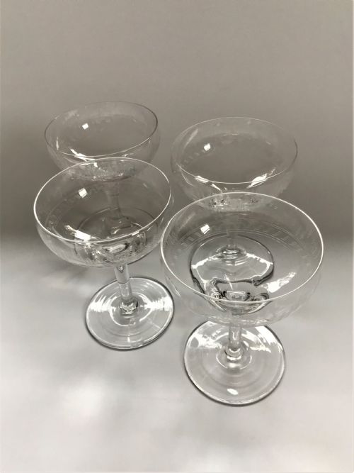 A Set of 4 Etched Champagne Bowls