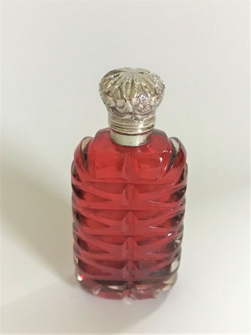 A Delightful Victorian Cranberry Silver Mounted Scent Bottle