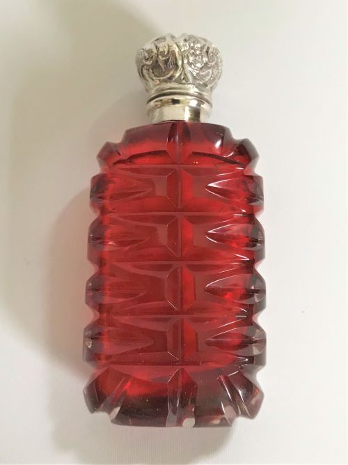fig 1. A delightful Victorian cranberry silver mounted scent bottle