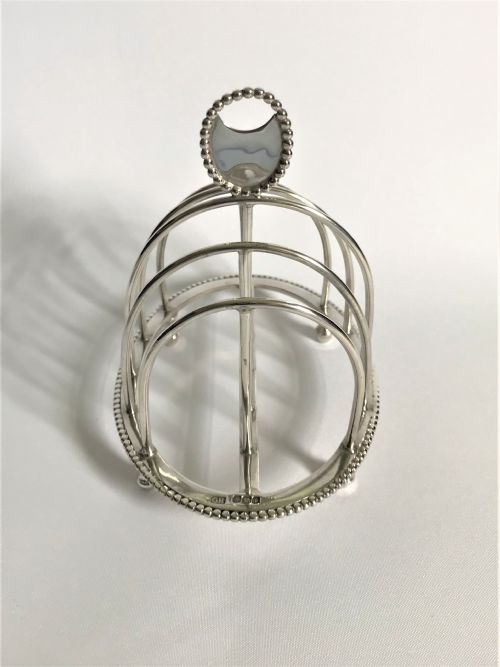 fig 1. A quality four slice silver toast rack