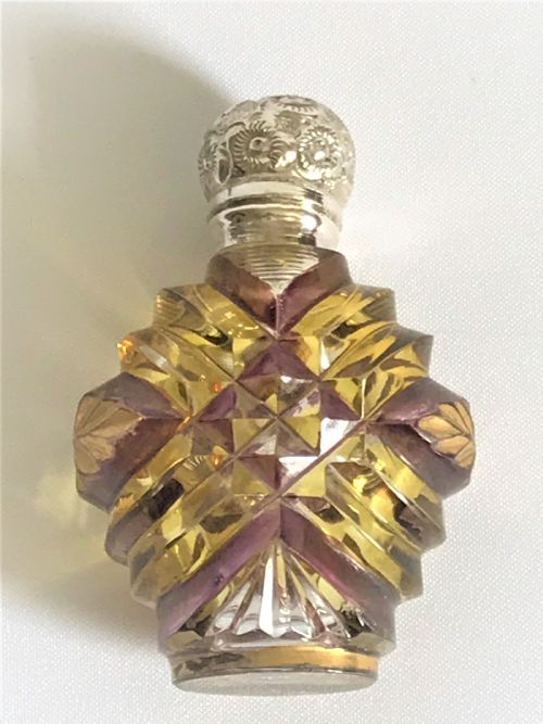fig 1. A superb Victorian silver mounted amber glass scent bottle
