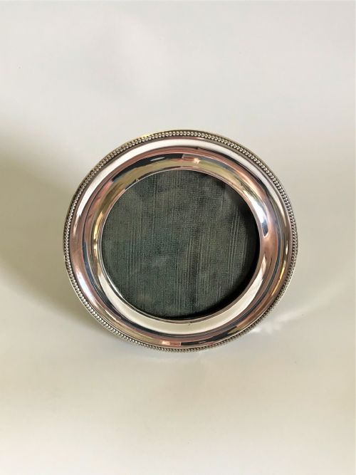 fig 1. A round George V silver photo frame