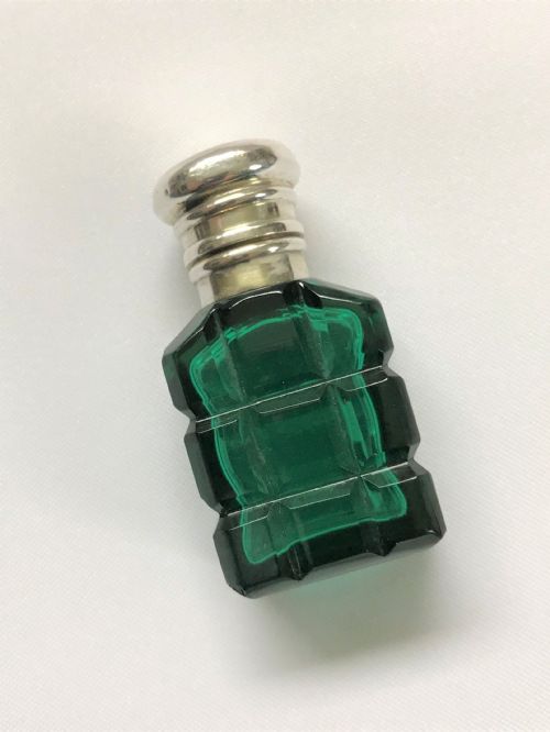 A Diminutive Victorian Silver Mounted Scent Bottle