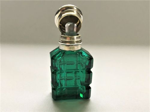 fig 1. A diminutive Victorian silver mounted scent bottle