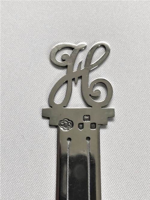 fig 1. A charming Victorian silver bookmark 'H' terminal