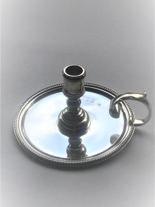fig 1. A late Victorian small silver chamber stick