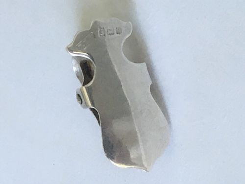 fig 1. An Edwardian silver 'shield' napkin clip