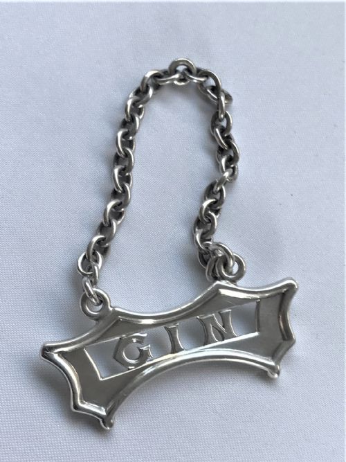A Superior Edwardian Silver Gin Decanter Label