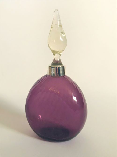 A Silver Mounted Amethyst Glass Cologne Bottle