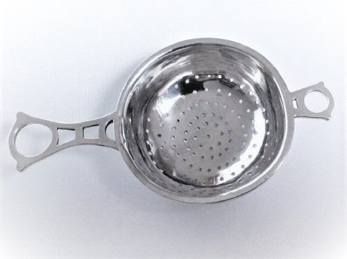 A Lovely Art Deco Silver Tea Strainer