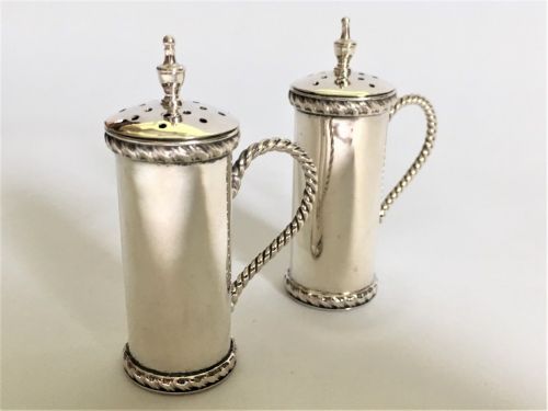 fig 1. A novelty pair of Edwardian silver pepper pots
