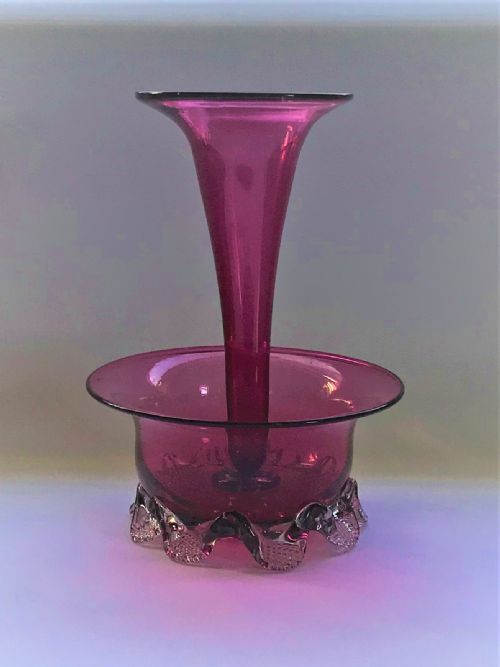 A Victorian Cranberry Trumpet Vase with Flower Bowl