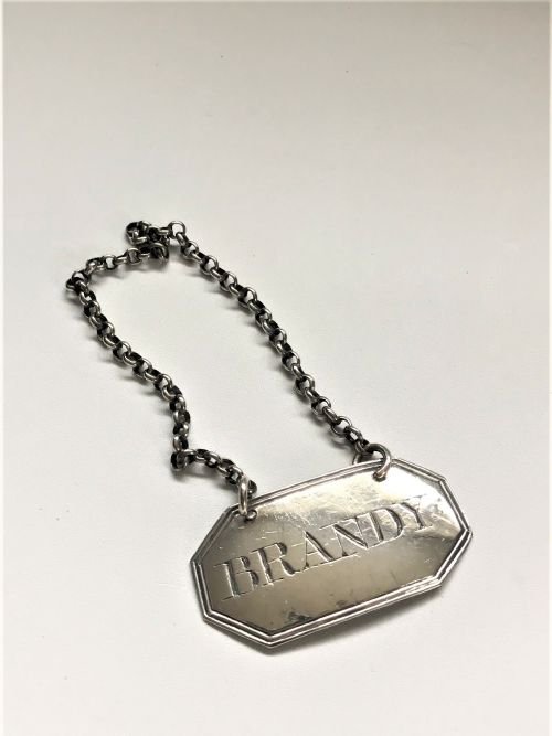 A Georgian Silver Brandy Decanter Label
