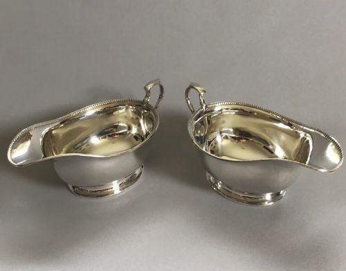 A Stylish Pair of Art Deco Silver Gravy Boats