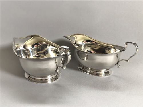 fig 1. A stylish pair of Art Deco silver gravy boats