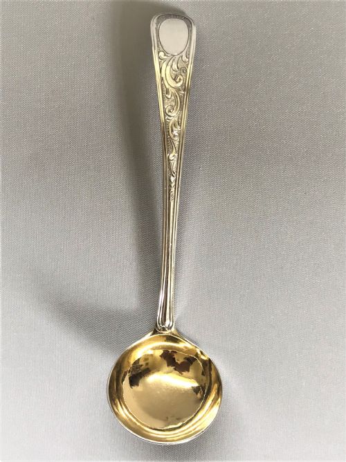 fig 1. A delightful 18th Century silver cream ladle