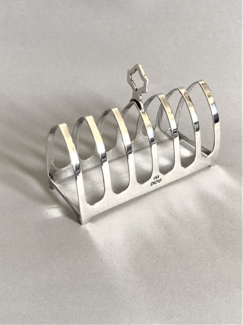 A Gothic Design Six Slice Silver Toast Rack