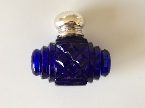 A Lovely Barrel Cut Victorian Silver Mounted Scent Bottle