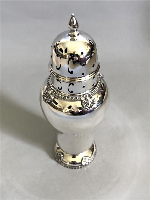 fig 1. A stylish silver sugar caster