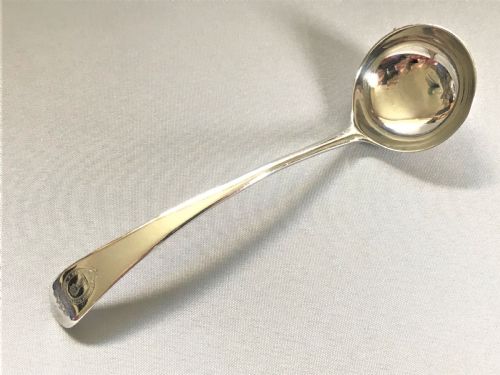 An Elegant Georgian Silver Cream Ladle
