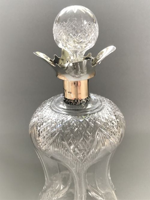 fig 1. A superb Edwardian silver mounted glug glug decanter