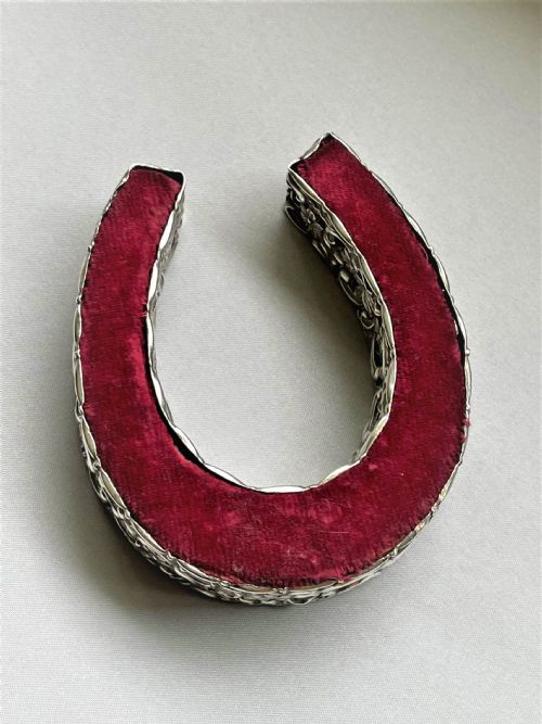 fig 1. A large Victorian 'lucky horseshoe' silver pin cushion