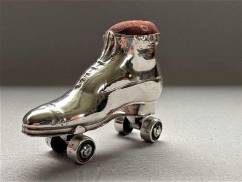 fig 1. An extremely rare Edwardian silver roller skate pin cushion