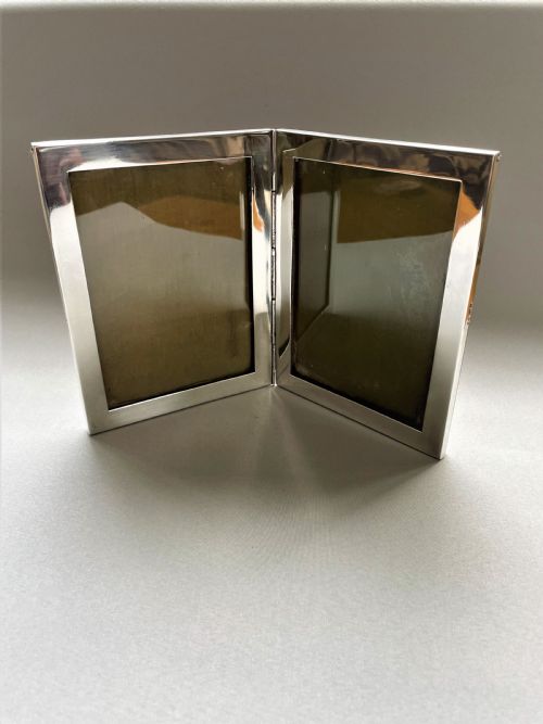 A Rare Silver Double Folding Photo Frame