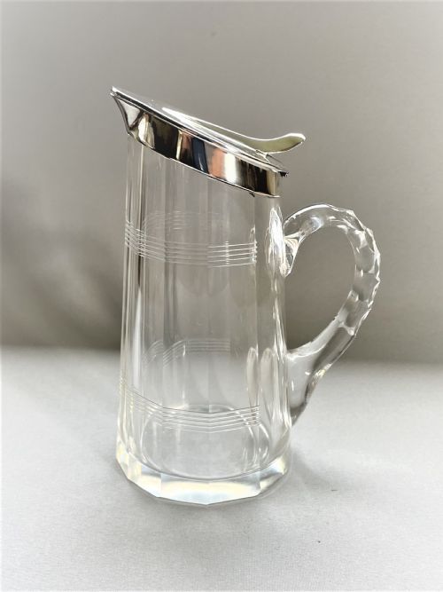 A Desirable Silver Mounted Cut Glass Whisky Companion