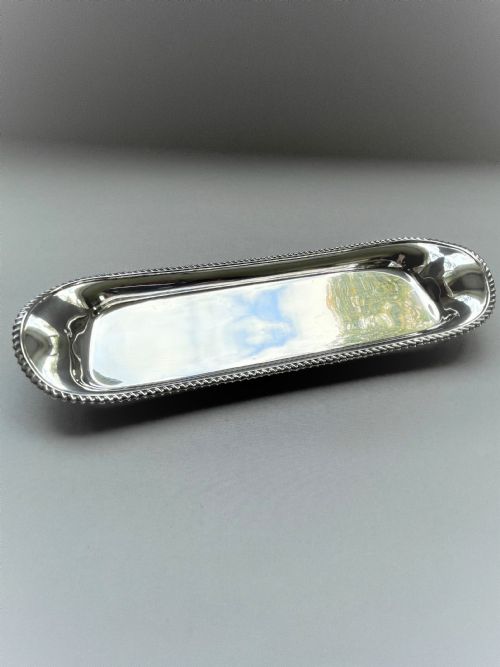 fig 1. A handsome Edwardian silver pen tray