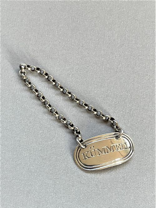A Desirable Silver 'Kummell' Tot Label