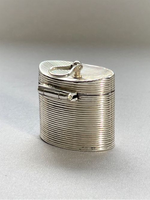 fig 1. An exquisite novelty Chester silver thimble and case