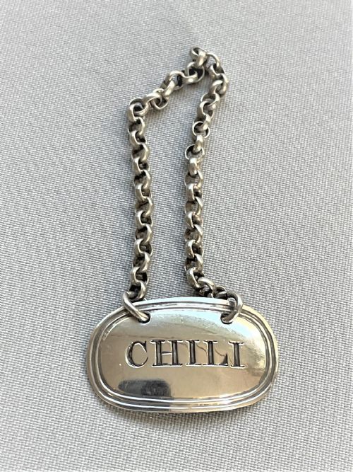 A Rare Victorian Silver 'Chili' Label