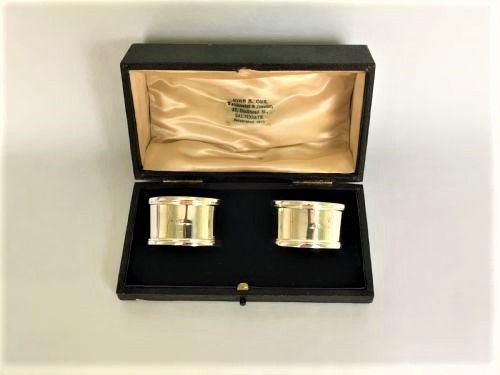 fig 1. An attractive pair of Edwardian boxed silver napkin rings