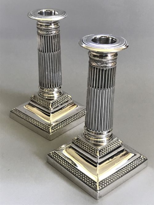 fig 1. A superb pair of Victorian silver candle sticks