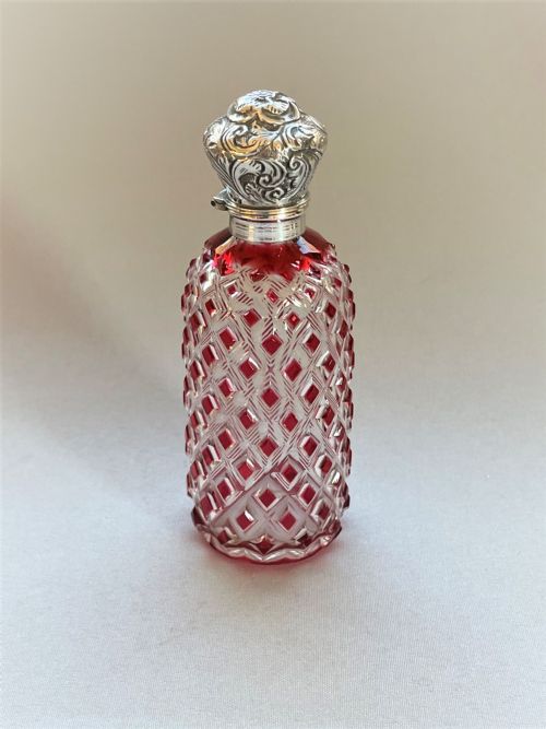 A Victorian Silver Mounted Cranberry Scent Bottle