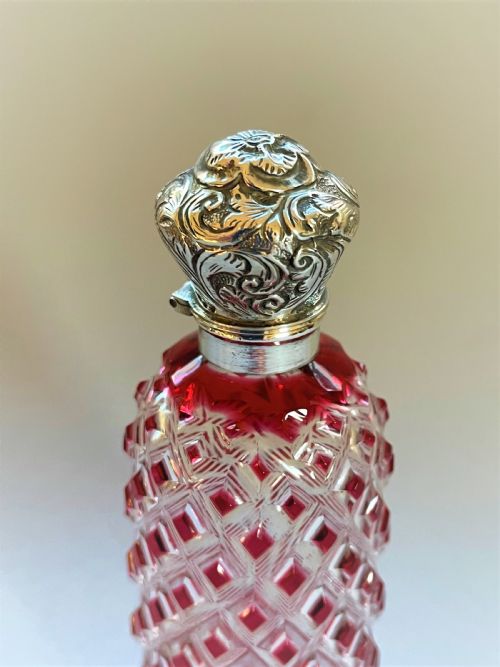 fig 1. A Victorian silver mounted cranberry scent bottle