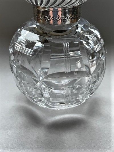 fig 1. A large Victorian silver mounted cologne bottle
