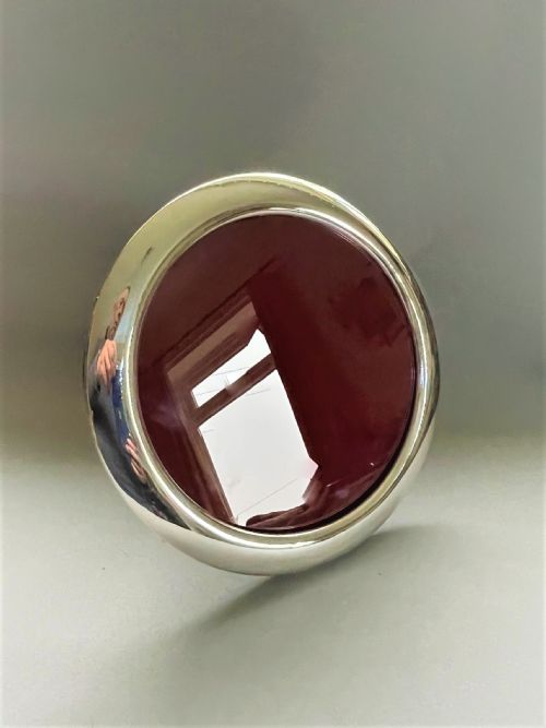 A Large Circular Silver Photo Frame