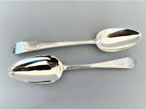 fig 1. A superb pair of Irish bright cut silver serving spoons