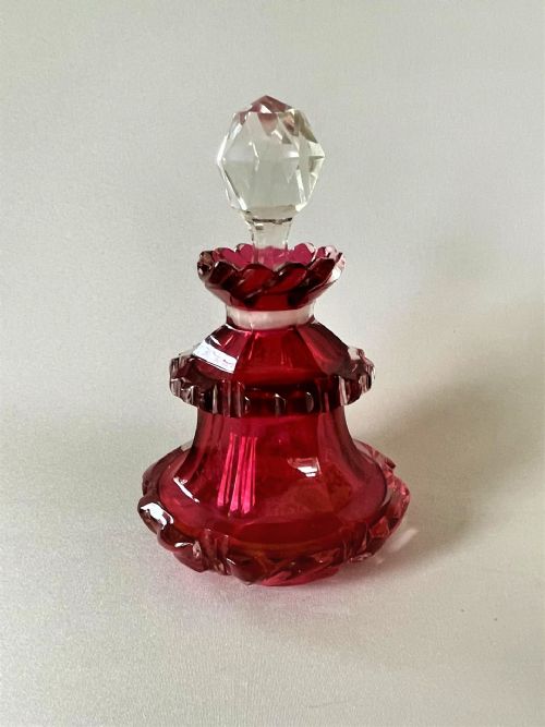 A Victorian Gothic Cranberry Table Cologne Bottle