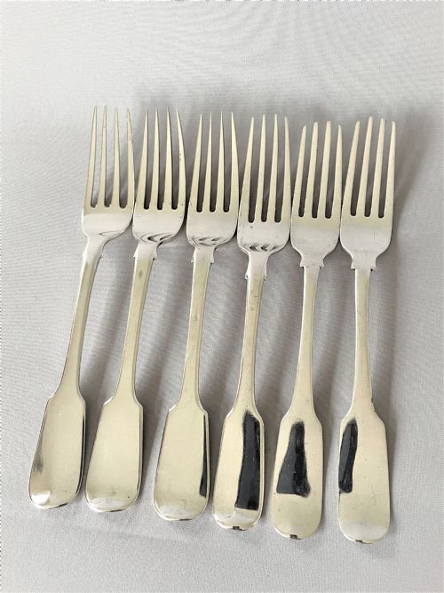A Harlequin Set of 6 Irish Silver Dessert Forks
