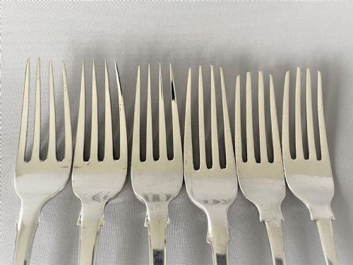 fig 1. A harlequin set of 6 Irish silver dessert forks