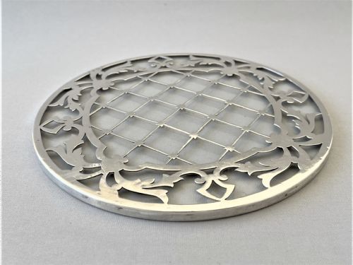 fig 1. A lovely silver cased teapot stand