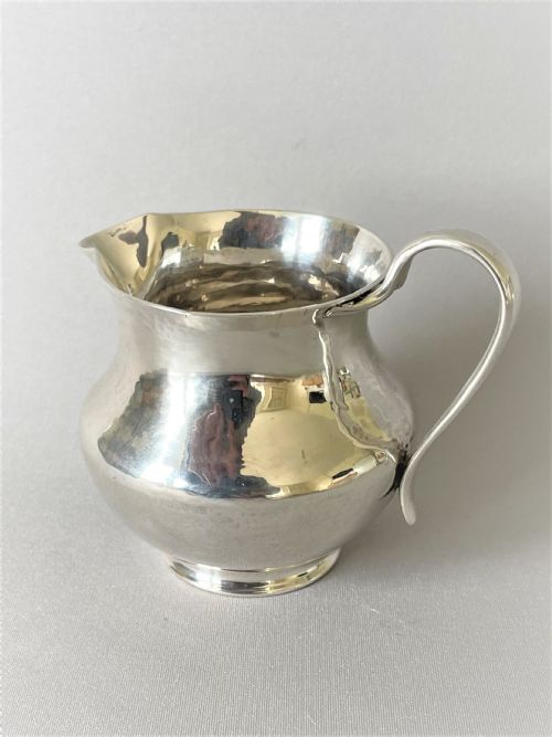 A Chester Silver Arts & Crafts Cream Jug