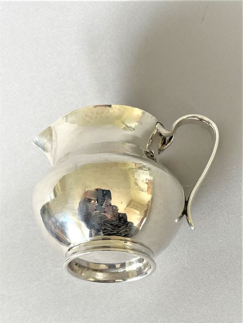 fig 1. A Chester silver Arts & Crafts cream jug