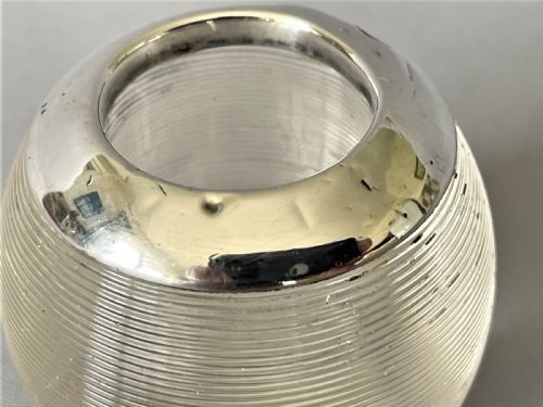 fig 1. A petite novelty Edwardian silver match striker