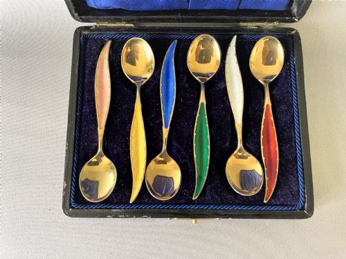 fig 1. A boxed set of silver & enamel Norwegian demi-tasse spoons