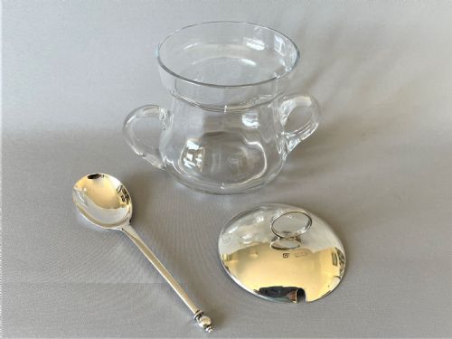 fig 1. A silver mounted preserve jar with hallmarked silver spoon